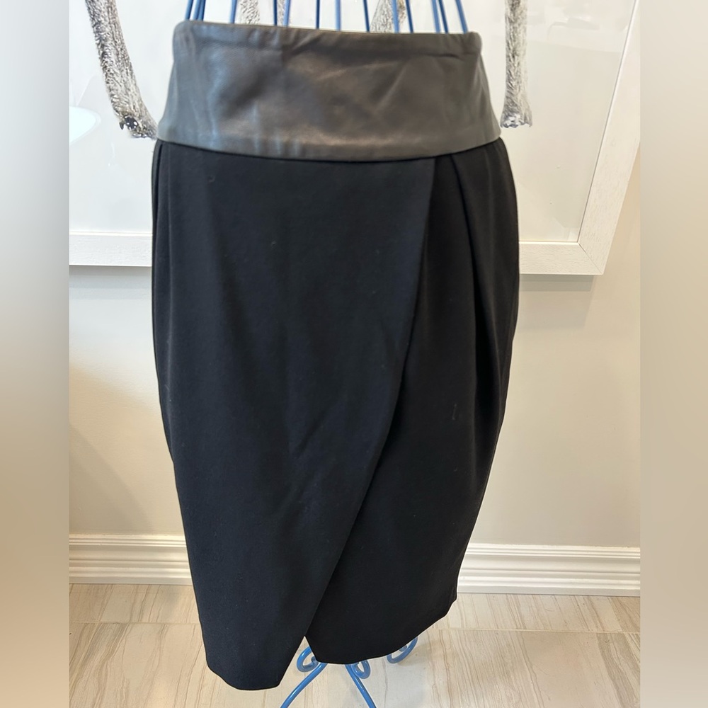 Club Monaco faux wrap skirt with real leather waistband. Size 2